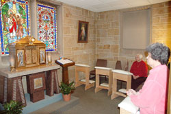 Carol Freeland, right, and Bobbie Lawless pray at the Perpetual Eucharistic Adoration Chapel at St. Therese of the Infant Jesus (Little Flower) Church in Indianapolis on Nov. 15. The adoration chapel has served Indianapolis East Deanery parishes for 20 years. (Photo by John Shaughnessy)