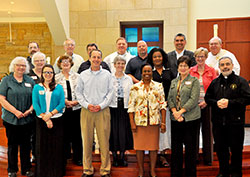 Members of the re-established Archdiocesan Pastoral Council pose after their installation at St. Bartholomew Church in Columbus on April 18. Front row: Sue Heck, left, Sara Castillo, Keith Bauer, Domoni Rouse, Mary Lee Smith and Father Joseph Moriarty. Middle row: Claudia Dominik, left, Mary Kay Wolford, Benedictine Sister Carol Falkner, Dabrice Bartet and Annette “Mickey” Lentz. Back row: Conventual Franciscan Father Mark Weaver, left, Larry Schremser, Bill Ward, Archbishop Joseph W. Tobin, Randy Ezell, Juan González and Deacon Wayne Davis. Not pictured are members Barbara Black, Paul Jannsen, Richard Steininger and Msgr. William Stumpf. (Photos by Natalie Hoefer)