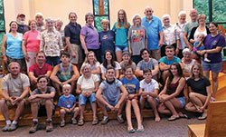 Youths, adult workers, members of the St. Agnes Ladies Guild, and several other adults who helped with the Nazareth Farm project are pictured inside St. Agnes Church in Nashville before taking part in a prayer service on July 23. (Submitted photo)